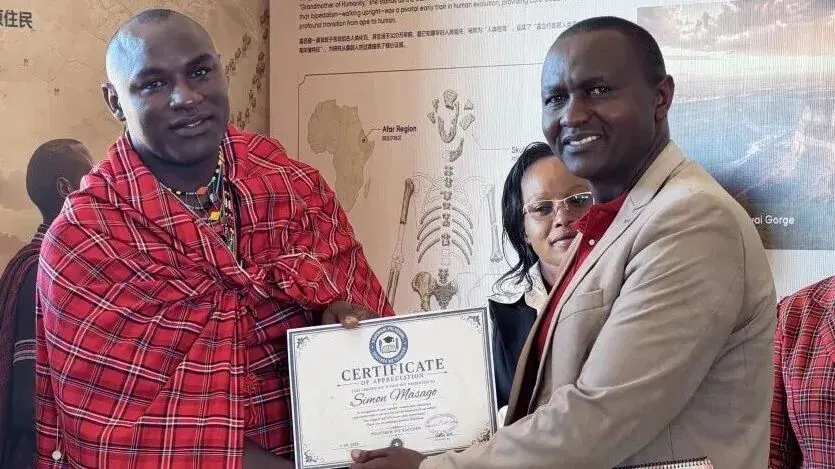 A certificate presented to a Maasai partner